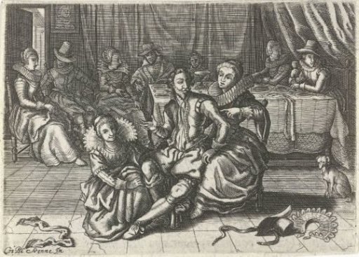 Two women undressing a man