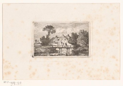 Angler on a small bridge near a farmhouse