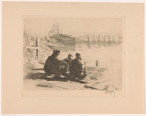 Volendam fishermen sitting in the harbour