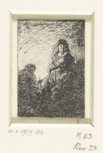 Standing woman and seated man