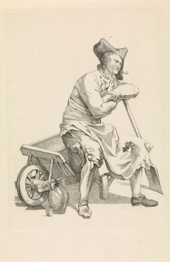 Man sitting on the edge of a wheelbarrow
