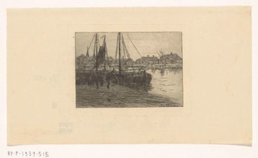 Moored sailing ships at a quay