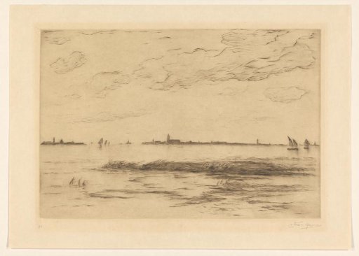 Sailing boats on the water, a city in the distance