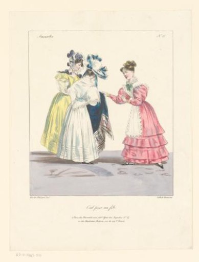 Woman showing a piece of cloth to two other women