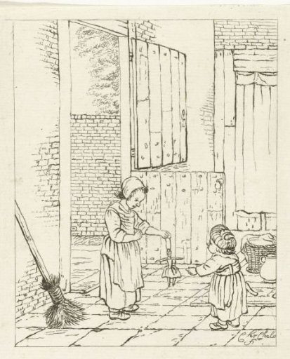 Two girls playing with a doll