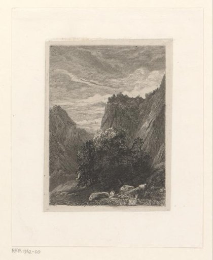 Swiss mountain landscape with a man under a deciduous tree