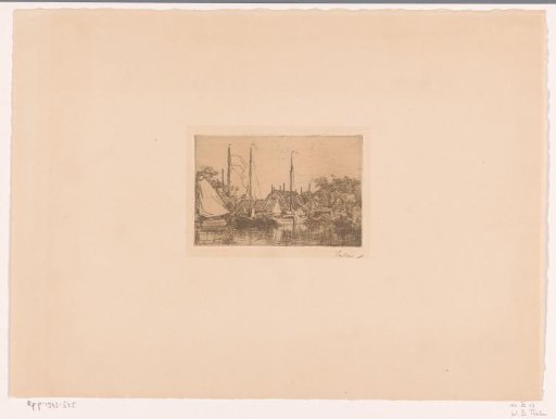 Moored boats, trees and houses on the water's edge