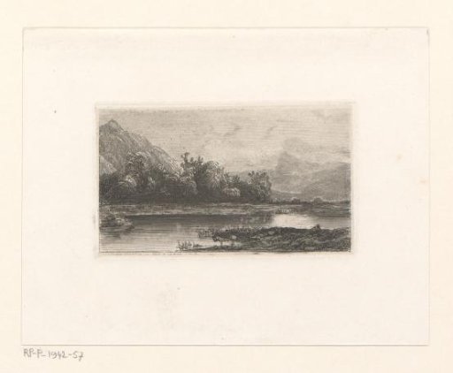 Trees along a Swiss landscape with a lake
