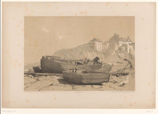 Rocky coast with boats and a fishing village