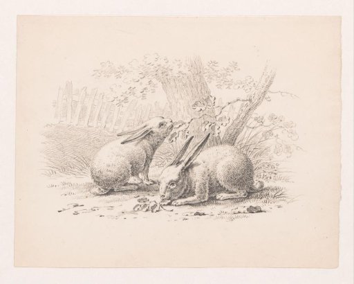 Two rabbits nibbling on leaves