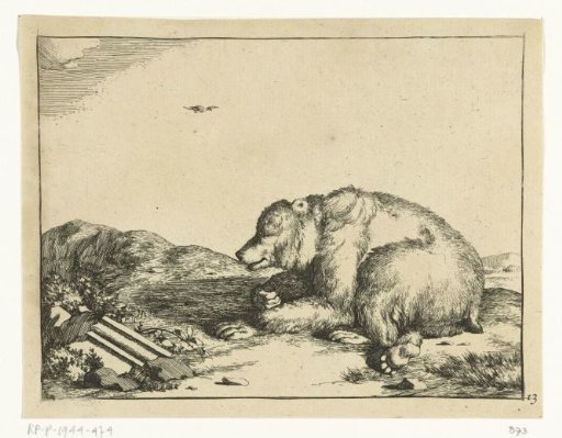 Recumbent bear beside part of a decorative border