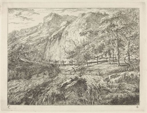 Pack mules on a bridge near a waterfall