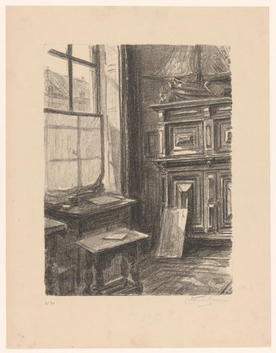 Interior of a studio with a table by the window
