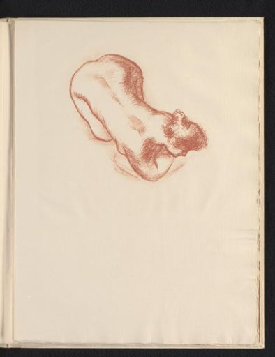 Nude woman kneeling on the ground, leaning forward