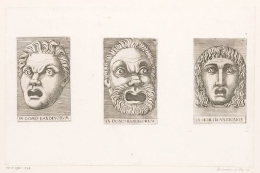 Three antique masks