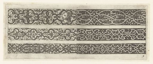 Three friezes stacked, with a mask in the upper frieze