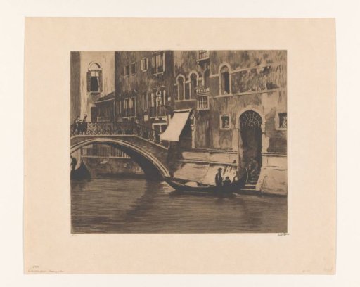 Gondola at a Bridge over a Canal in Venice