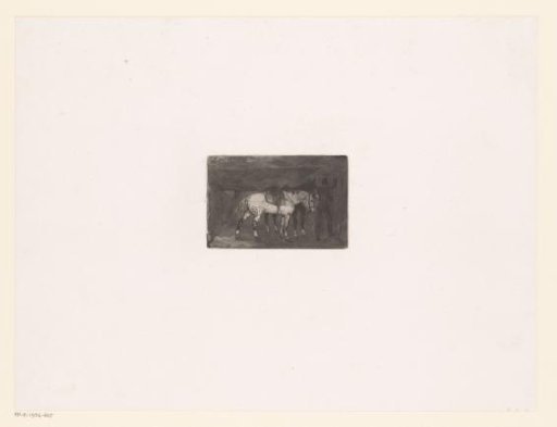 Man with two horses in a stable