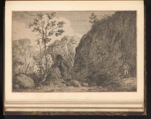 Landscape with a hunter by rocks