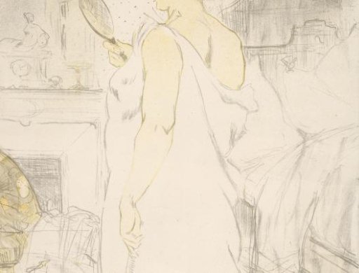 Standing woman looking into a hand mirror