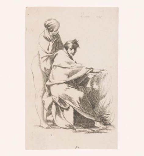 Man and woman by a fire