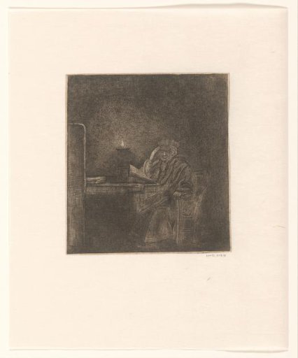 Student at a table by candlelight