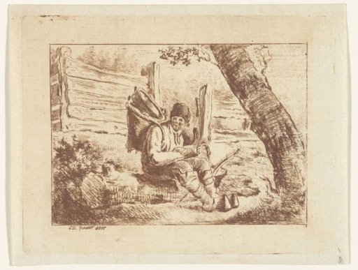 Man seated with basket on his back