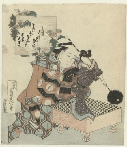 Puppeteer with a puppet and a go board