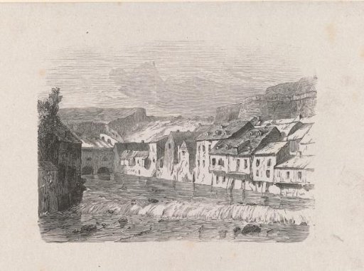 River flowing through a village in the mountains