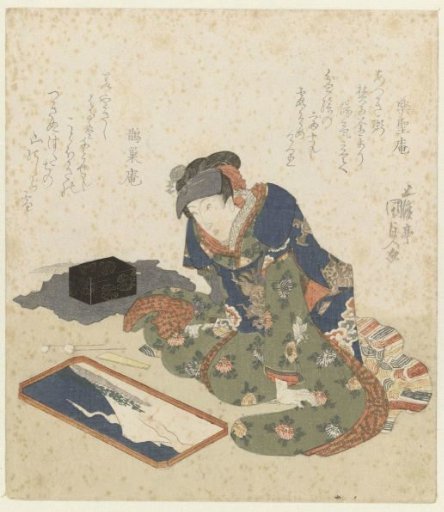 Woman making a sand painting