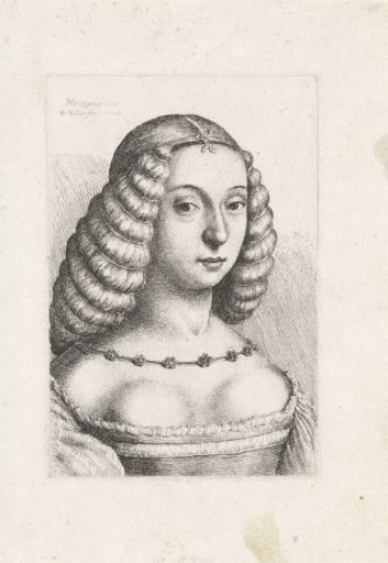 Portrait of a young woman with her hair tied up in rolls