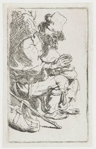 Beggar warming his hands