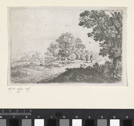 Country road with two pedestrians and a dog