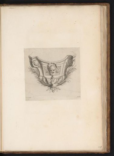 Ornament with a mask and a phoenix
