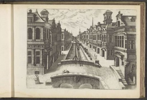 View of a canal or moat with houses on both sides
