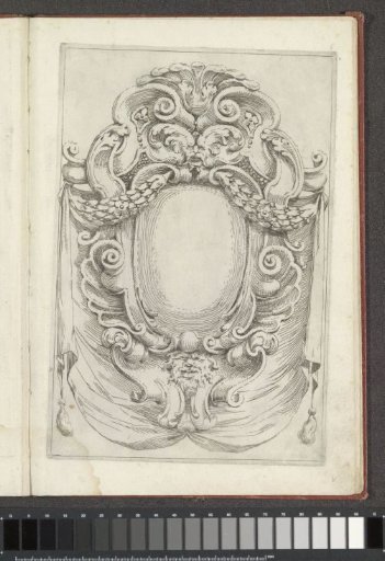 Cartouche with festoons and fantasy heads