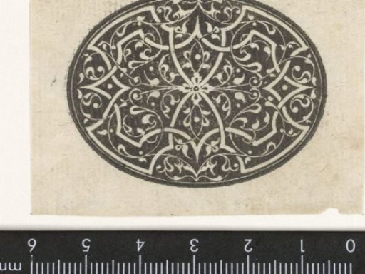 Oval with white moorsque and arabesques on a black ground