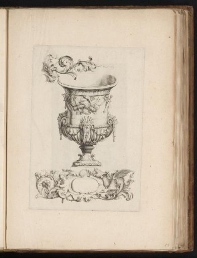 Vase with armorial trophies and a cartouche