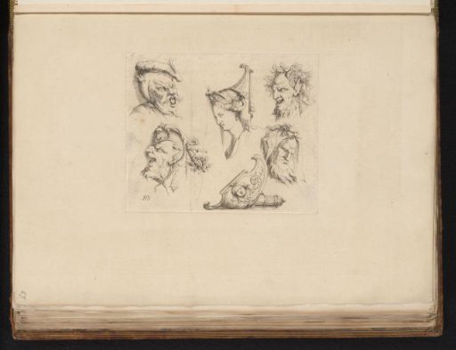 Ornaments with masks of men and satyrs