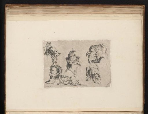 Ornaments with Minerva and satyr heads