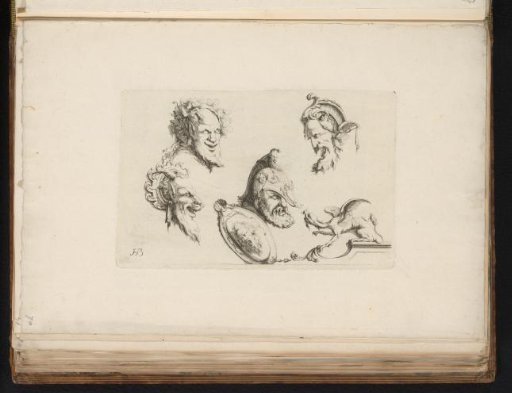 Ornaments with masks and a fantasy creature