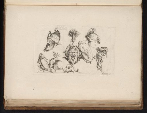 Ornaments with masks and a fantasy creature