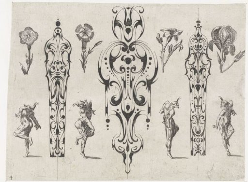 Three elongated scrollwork ornaments