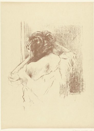 Woman in front of a mirror putting up her hair
