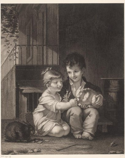 Two children with rabbits