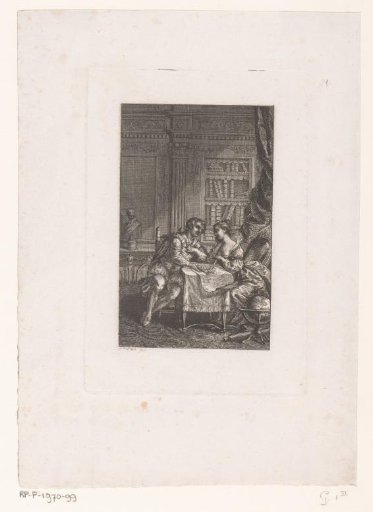 Man and woman at a table in a study