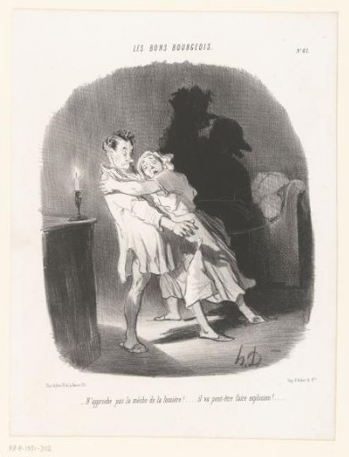 Married couple by candlelight in the bedroom