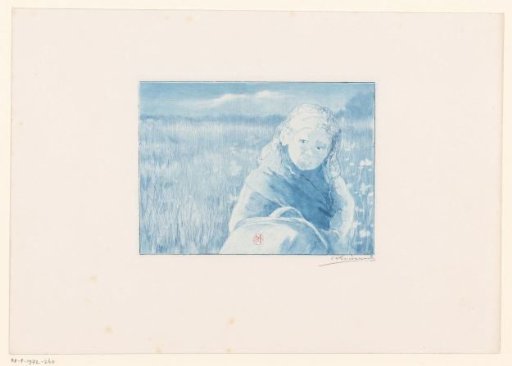 Girl with a basket in a flower meadow