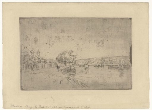 View of the Loing river with boats from the bank