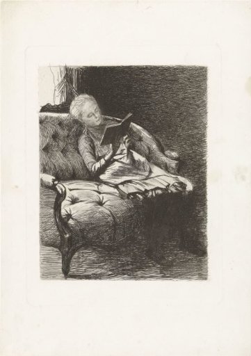 Girl reading on a sofa.